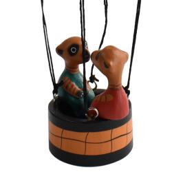 2 Meerkats in a hot air balloon hand carved from Albesia wood, 35cm x 11 cm