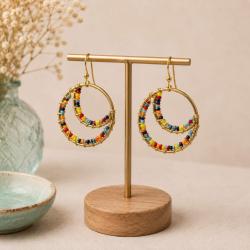 Earrings gold colour circle with multicoloured beads  
