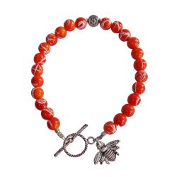 Bracelet with orange beads and bee