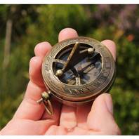 Pocket sundial and compass in brass