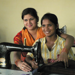 Karm Marg artisans making a bag