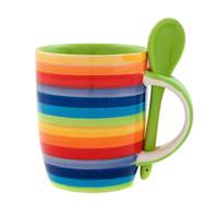 Rainbow mug and green spoon
