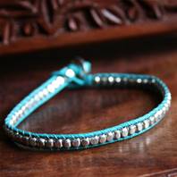 Bracelet blue cord silver colour beads