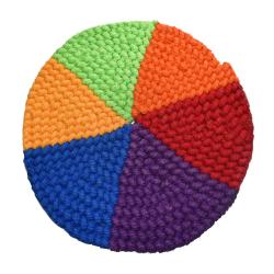 Place mat crocheted cotton, rainbow colours 20cm diameter