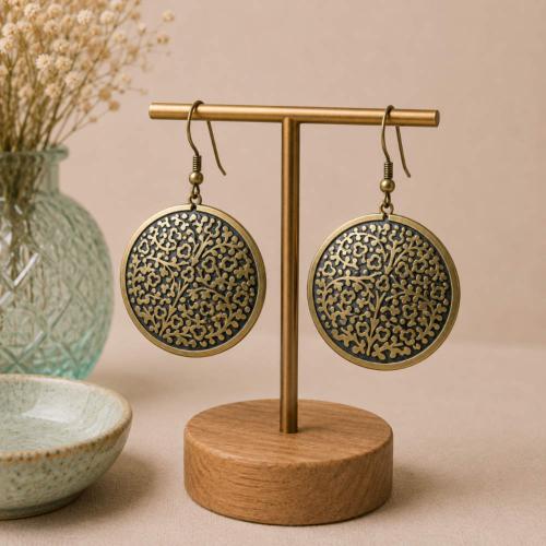 Earrings black and gold coloured circle