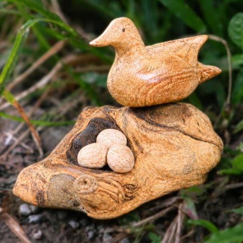 Handcrafted Wooden Duck with Three Eggs