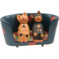 2 cats on round sofa