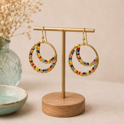 Earrings gold colour circle with multicoloured beads  