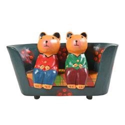  2 bears on a floral sofa hand carved Albesia wood, 15 x 8 x 4cm