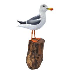 Herring gull on tree trunk, hand carved and painted 13 x 18 x 33cm