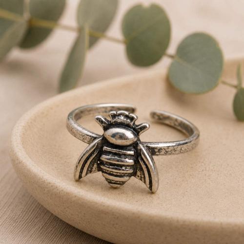 Brass ring with bee, silver colour