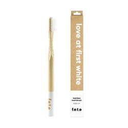 White medium bristled adult's toothbrush made from eco-friendly Bamboo