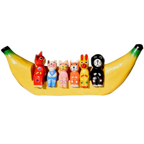 Animals on banana sofa, 4 cats, dog and rabbit